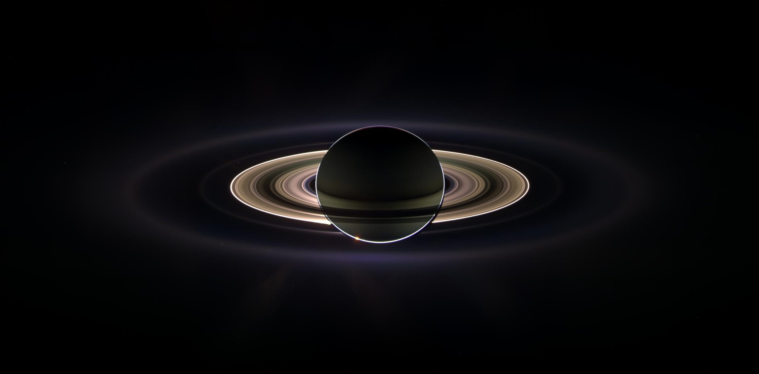 Fig2: Another stunning image below from the spacecraft Cassini is this somewhat artificial total solar eclipse seen from the vantage point of the spacecraft, highlighting the beauty of Saturn's rings. Credit: NASA/JPL/Space Science Institute.