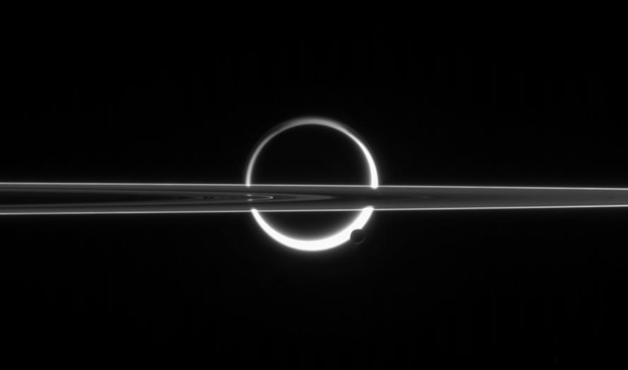 Fig1: Sun being eclipsed by Saturn's moon Titan, as seen by the spacecraft Cassini. On the lower right of the ring, one can also see Saturn's moon Enceladus. Credit: NASA/JPL/Space Science Institute.